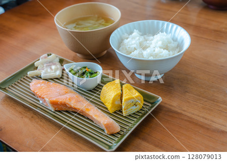 Japanese breakfast of grilled salmon and rolled egg 128079013