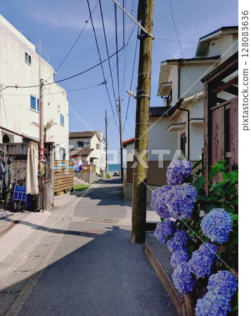 A small street leading to the sea A small street leading to the sea 128083636