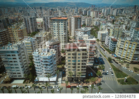 Aerial view of dense urban skyline with apartment buildings 128084878
