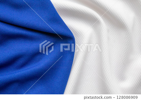 Blue and white sports clothing fabric football shirt jersey texture background 128086909