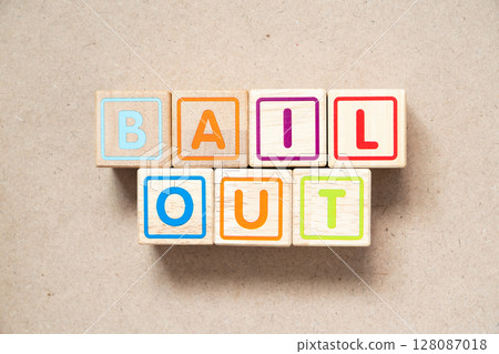 Alphabet letter block in word bail out on wood background 128087018