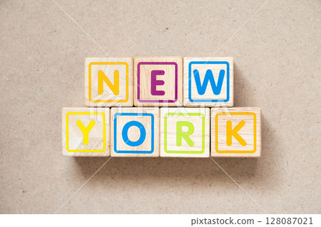 Alphabet letter block in word new york on wood background 128087021