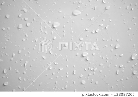 Water drops on white wall background texture Water drops on white wall background texture 128087205
