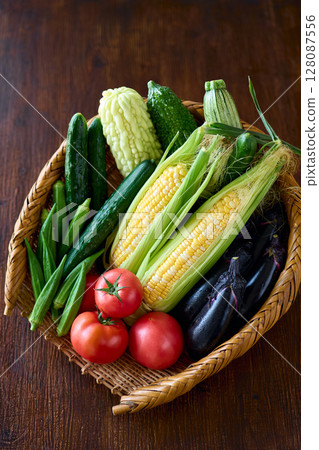 Summer vegetables in a colander 128087556
