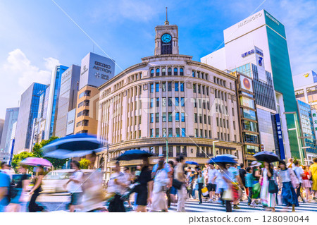 Tokyo cityscape, Japan. View of Ginza 4-Chome and Seiko House Ginza bustling with foreign tourists (4th) 128090044