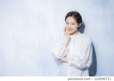 Woman in white blouse Woman in white blouse 128090711