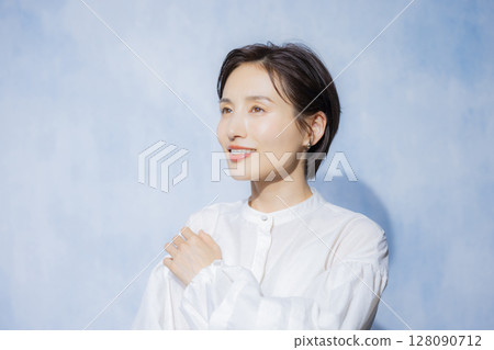 Woman in white blouse Woman in white blouse 128090712