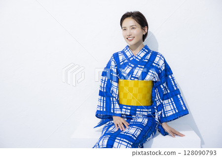 A woman in a yukata A woman in a yukata 128090793