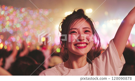 Shining smiles at a music festival Shining smiles at a music festival 128090878