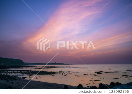 Dramatic Sunset Over Shimen Coastline in New Taipei City Taiwan. 128092596