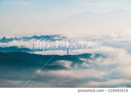 Misty Morning Over Shilin New Taipei Taiwan with Taipei City Silhouette. 128092619