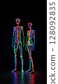 Neon skeletons couple standing in the dark 128092835