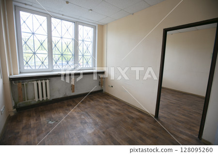 Empty room with beige walls. Empty room with beige walls. 128095260