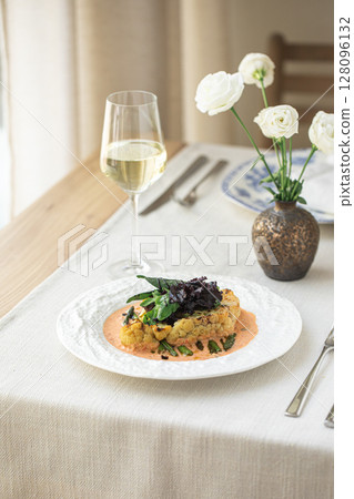 Cauliflower steak with asparagus and sauce Cauliflower steak with asparagus and sauce 128096132