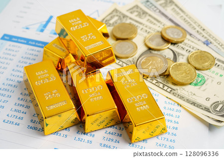 Gold bars with US dollar and Euro banknote money, finance trading investment business currency concept. 128096336