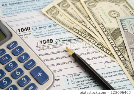 Tax form 1040 U.S. Individual Income Tax Return, business finance concept. Tax form 1040 U.S. Individual Income Tax Return, business finance concept. 128096463
