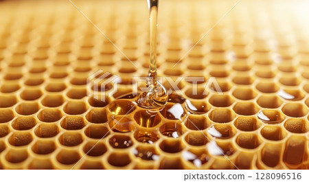 Golden Honey Dripping on Honeycomb Macro Photography Liquid Food Texture	 128096516