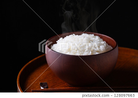 White rice on a black background 128097663