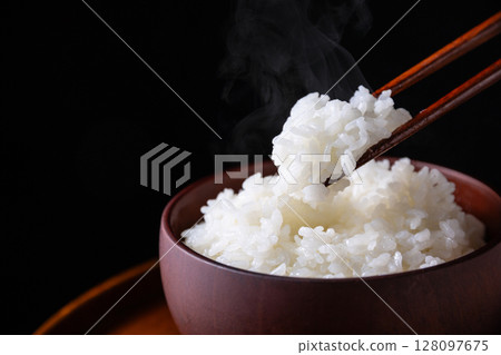 White rice on a black background 128097675