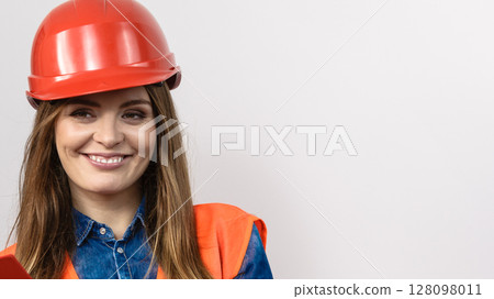 Woman engineer construction builder in helmet. Woman engineer construction builder in helmet. 128098011