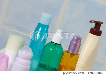 Toiletries in bathroom on shelf 128098066