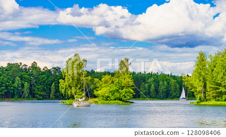 Yachts on lake in Tuchola Forests, Poland. 128098406