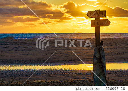 Sign in spanish at beach navigate surfing school and kitesurf 128098418