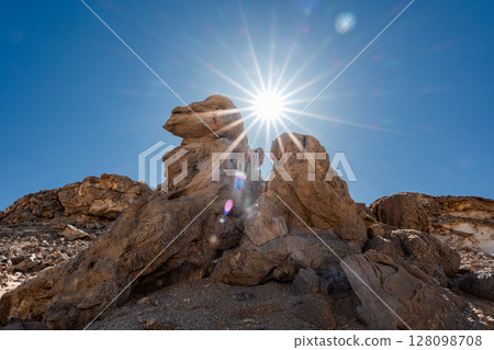 White rock formations and sand dunes in Egypt's White Desert, natural desert landscape White rock formations and sand dunes in Egypt's White Desert, natural desert landscape 128098708