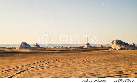 White rock formations and sand dunes in Egypt's White Desert, natural desert landscape	 128098869
