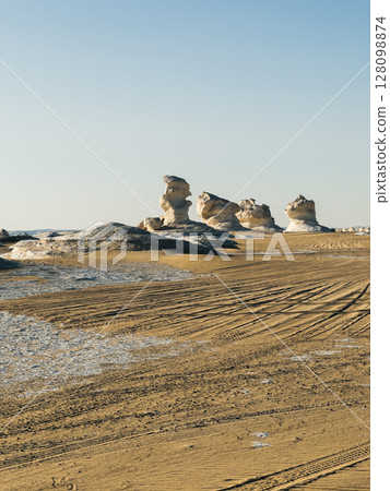 White rock formations and sand dunes in Egypt's White Desert, natural desert landscape	 128098874