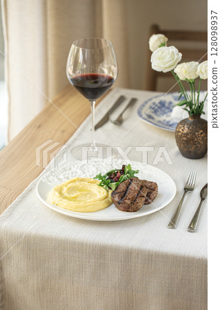 Beef medallions with mashed potatoes and sauce Beef medallions with mashed potatoes and sauce 128098937