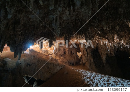 Djara Cave in Egypt with impressive stalagmites and natural rock formations. A hidden geological wonder in the heart of the Sahara desert	 128099157