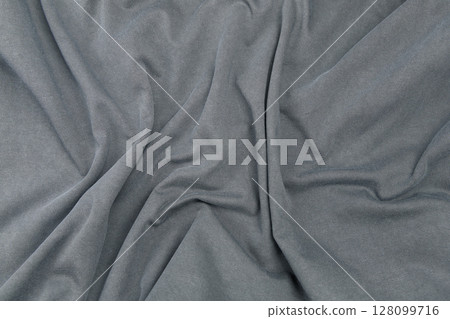 A detailed close-up texture background of cotton fabric A detailed close-up texture background of cotton fabric 128099716