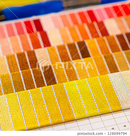 Palette of thread colors. Threads for embroidery knitting 128099794