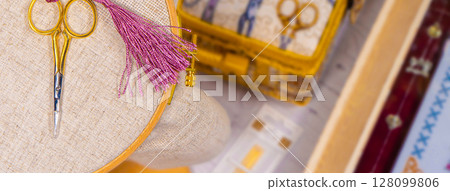 Accessories for hobby. Hoop snaps, scissors, threads, needles and scissors. Vintage tools for embroidery and knitting Accessories for hobby. Hoop snaps, scissors, threads, needles and scissors. Vintage tools for embroidery and knitting 128099806