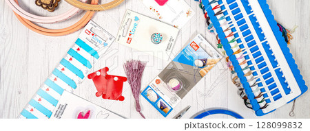 Accessories for hobbies. Needles, threads, hoops snaps, marker, stick for knitting and embroidery 128099832