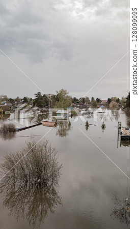 Global warming, floods on the planet.The apocalypse, catastrophes.Storms and destruction.Natural disasters,climate change,the riot of nature.The remnants of human life are floating in dirty water.End 128099995