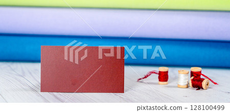 Fabric for embroidery. Color canvas in the shop for embroidery. Accessories for hobbies Fabric for embroidery. Color canvas in the shop for embroidery. Accessories for hobbies 128100499