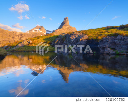 Norway. Mountain landscape. View of a high mountain in a valley.  128100762