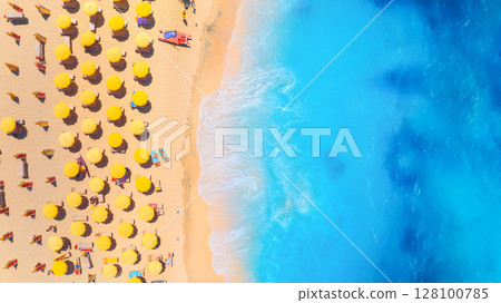 Summer vacation and rest. Beach, people and umbrellas. 128100785