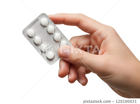 Hand holding blister pack of white pills, medication or supplement, isolated on transparent background, pharmacy, treatment, prescription drugs, healthcare 128100831