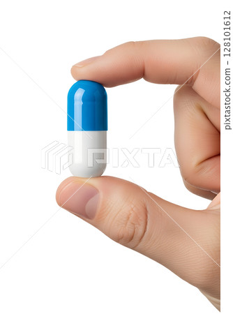 Blue and white capsule held between fingers, medicine or supplement, isolated on transparent background, healthcare, pharmacy, dosage concept Blue and white capsule held between fingers, medicine or supplement, isolated on transparent background, healthcare, pharmacy, dosage concept 128101612