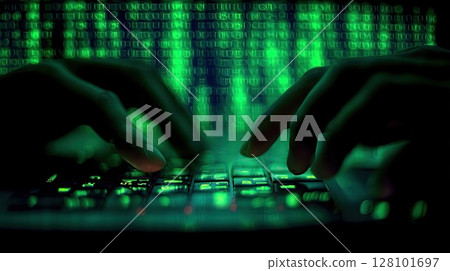 Hands typing on a keyboard with digital code in the background, symbolizing technology and cyber activity. 128101697
