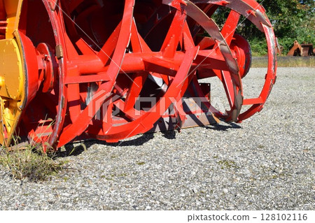 Snowplow waiting in a snowy country 128102116