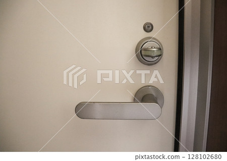 Front door lock and doorknob (lever handle) 128102680