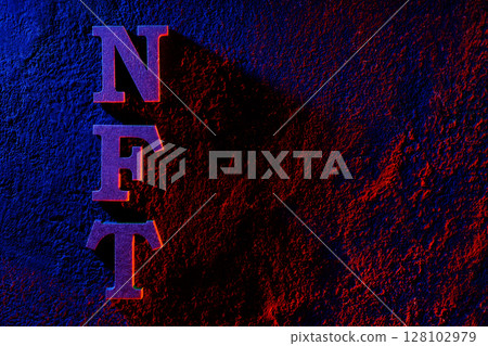 Non-Fungible Token in Neon Lighting Top View Copy Space Non-Fungible Token in Neon Lighting Top View Copy Space 128102979
