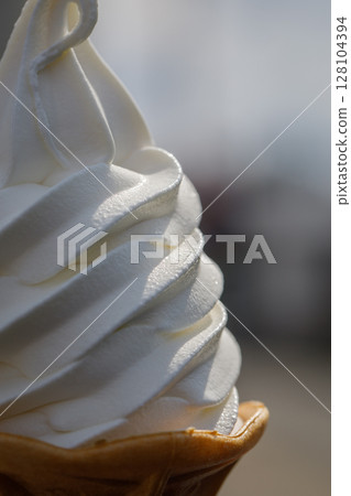 Soft serve ice cream close-up (vanilla) Soft serve ice cream close-up (vanilla) 128104394