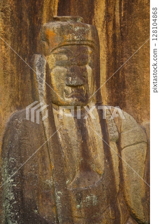 Bungo-Ono City: The Buddha statue carved into the rock at Fukoji Temple Bungo-Ono City: The Buddha statue carved into the rock at Fukoji Temple 128104868