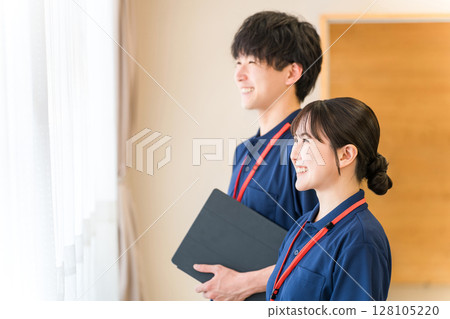 Care managers and occupational therapists working in nursing care facilities and day care centers 128105220
