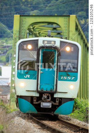 1500 series diesel railcar crossing the Sadamitsu River Bridge (JR Shikoku) 1500 series diesel railcar crossing the Sadamitsu River Bridge (JR Shikoku) 128105246